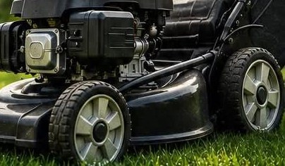 Lawn mower on a freshly cut lawn